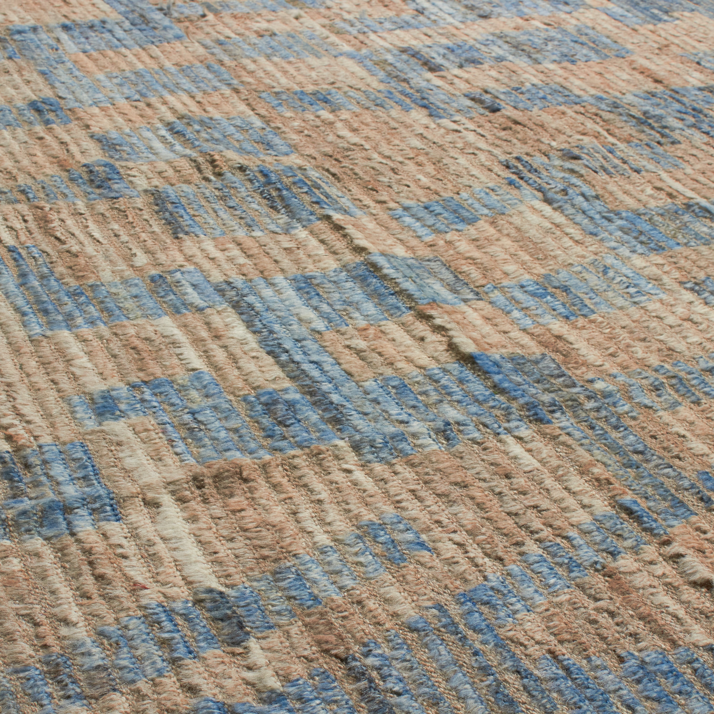 Revered for its lustre and soft hand, the natural qualities of wool from ancient Karakul sheep are honoured through restraint and refinement.