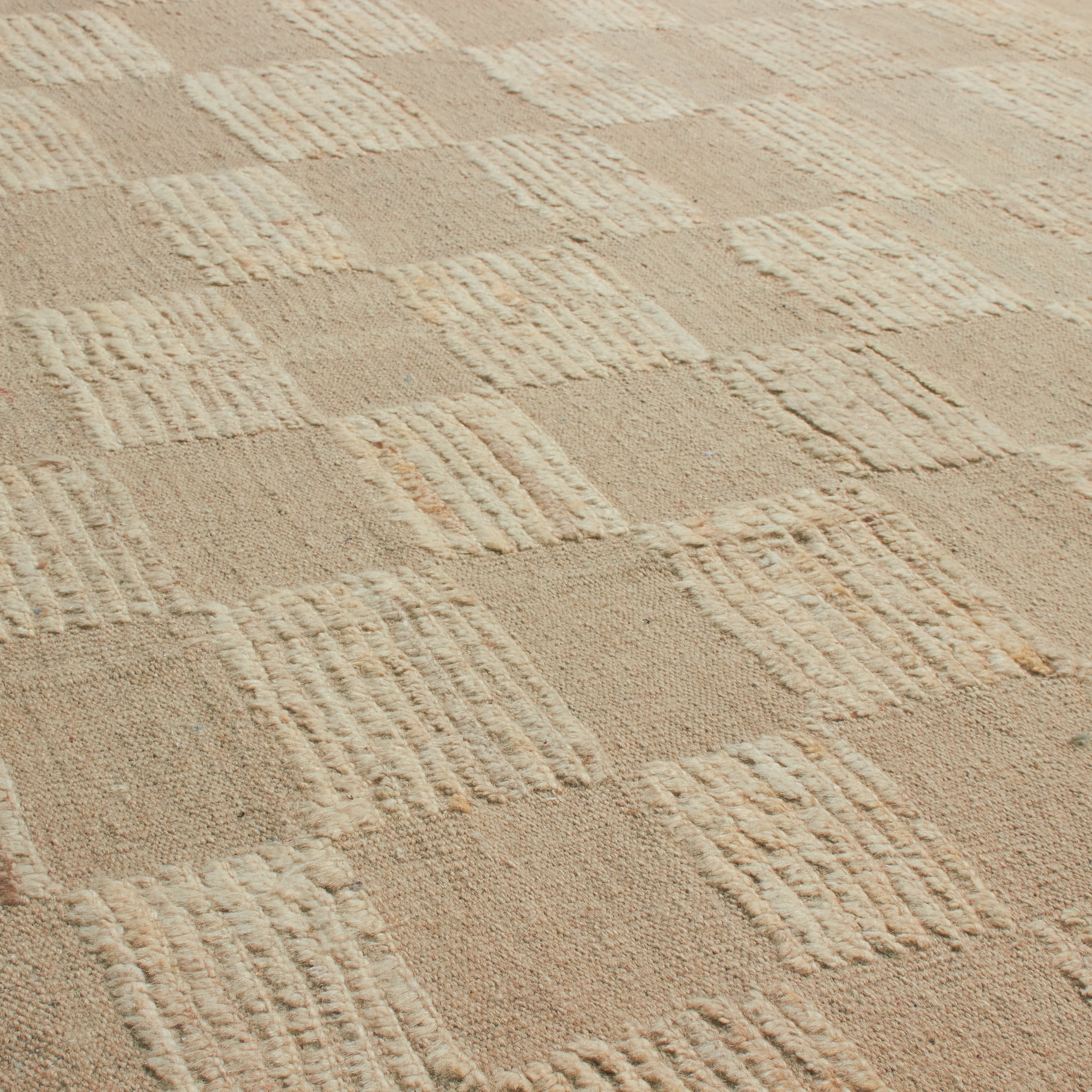 Revered for its lustre and soft hand, the natural qualities of wool from ancient Karakul sheep are honoured through restraint and refinement.
