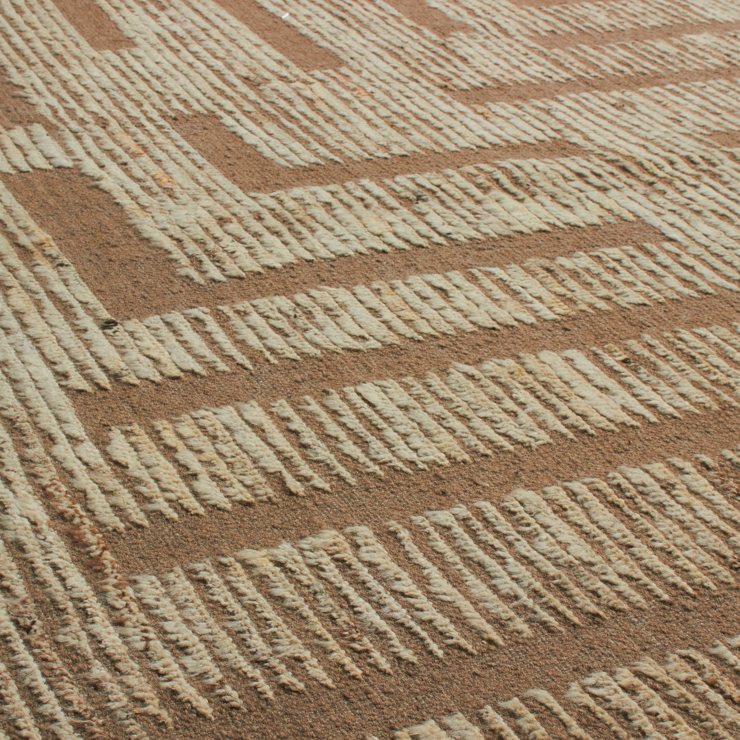 Revered for its lustre and soft hand, the natural qualities of wool from ancient Karakul sheep are honoured through restraint and refinement.