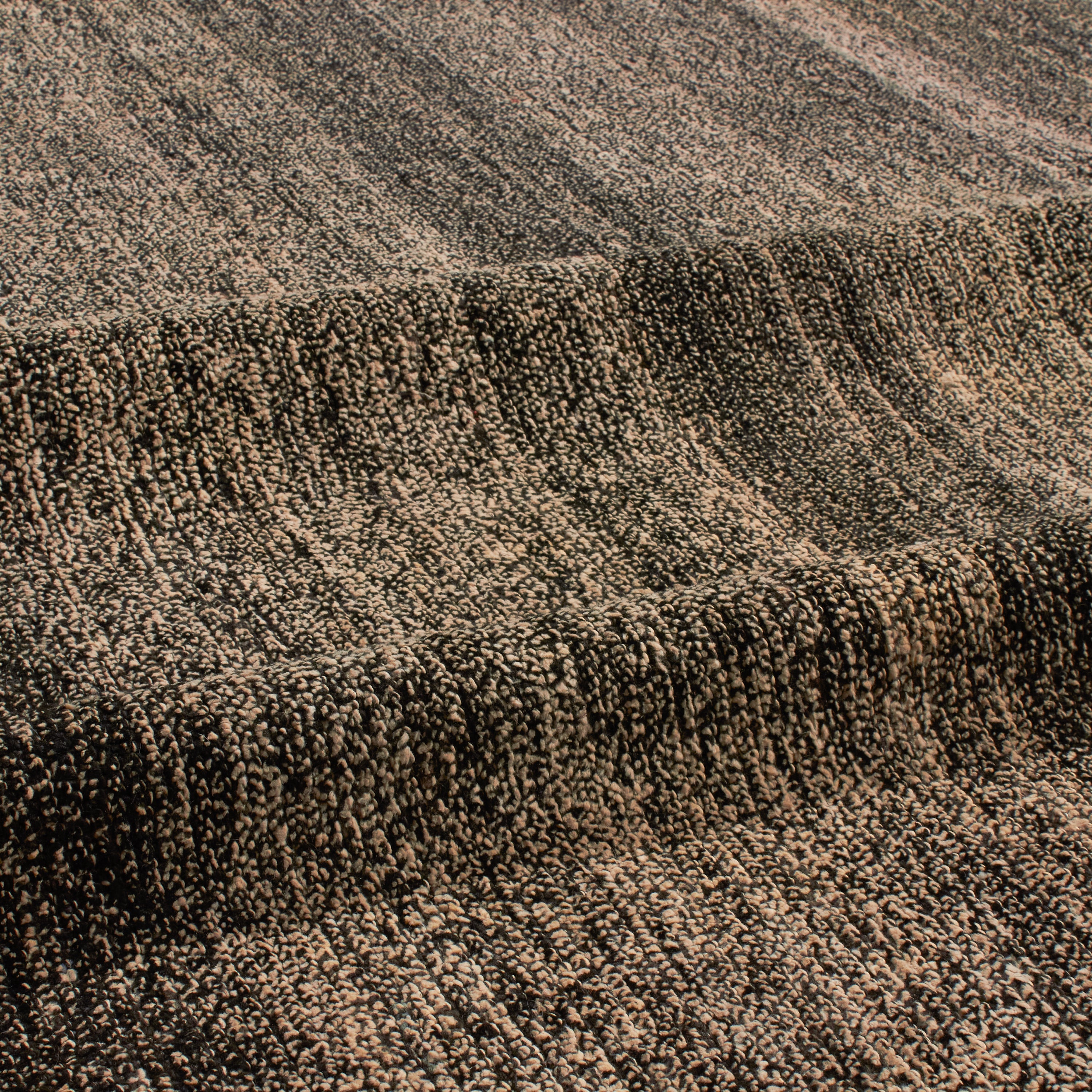 Revered for its lustre and soft hand, the natural qualities of wool from ancient Karakul sheep are honoured through restraint and refinement.
