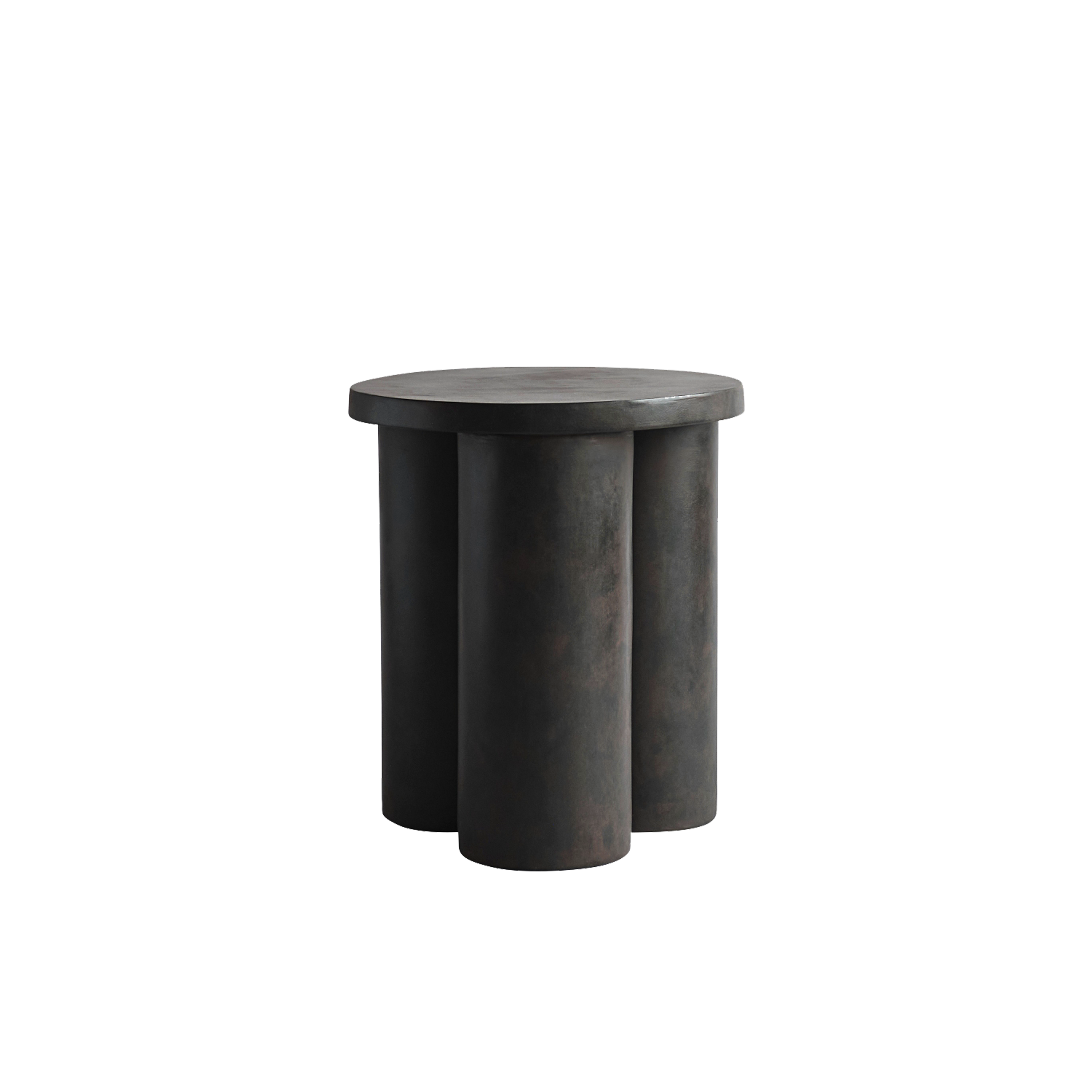 Characterized by sculptural cylinder-shaped legs, the Big Foot Stool draws its inspiration from mid-20th-century Brutalist architecture.