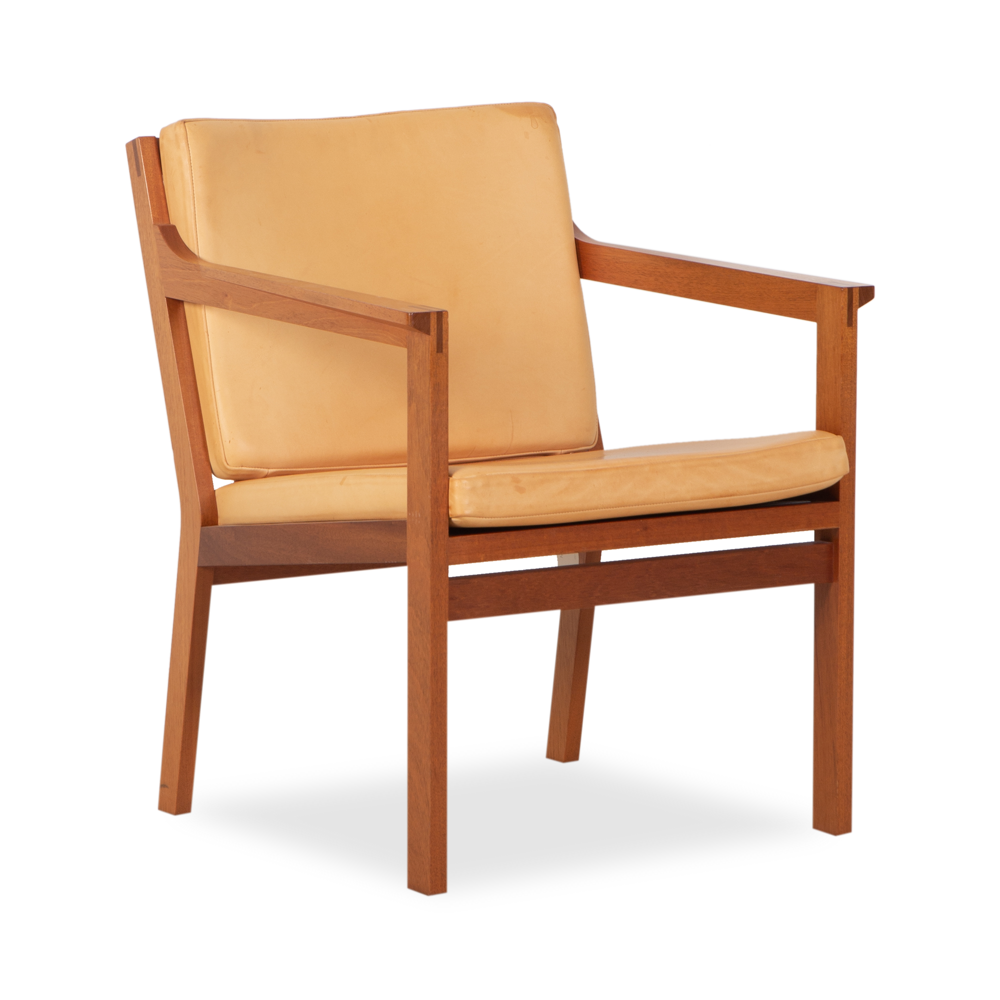Clean and elegant, this vintage leather armchair was designed by Christian Hvidt for Soborg Mobler, circa 1980s.