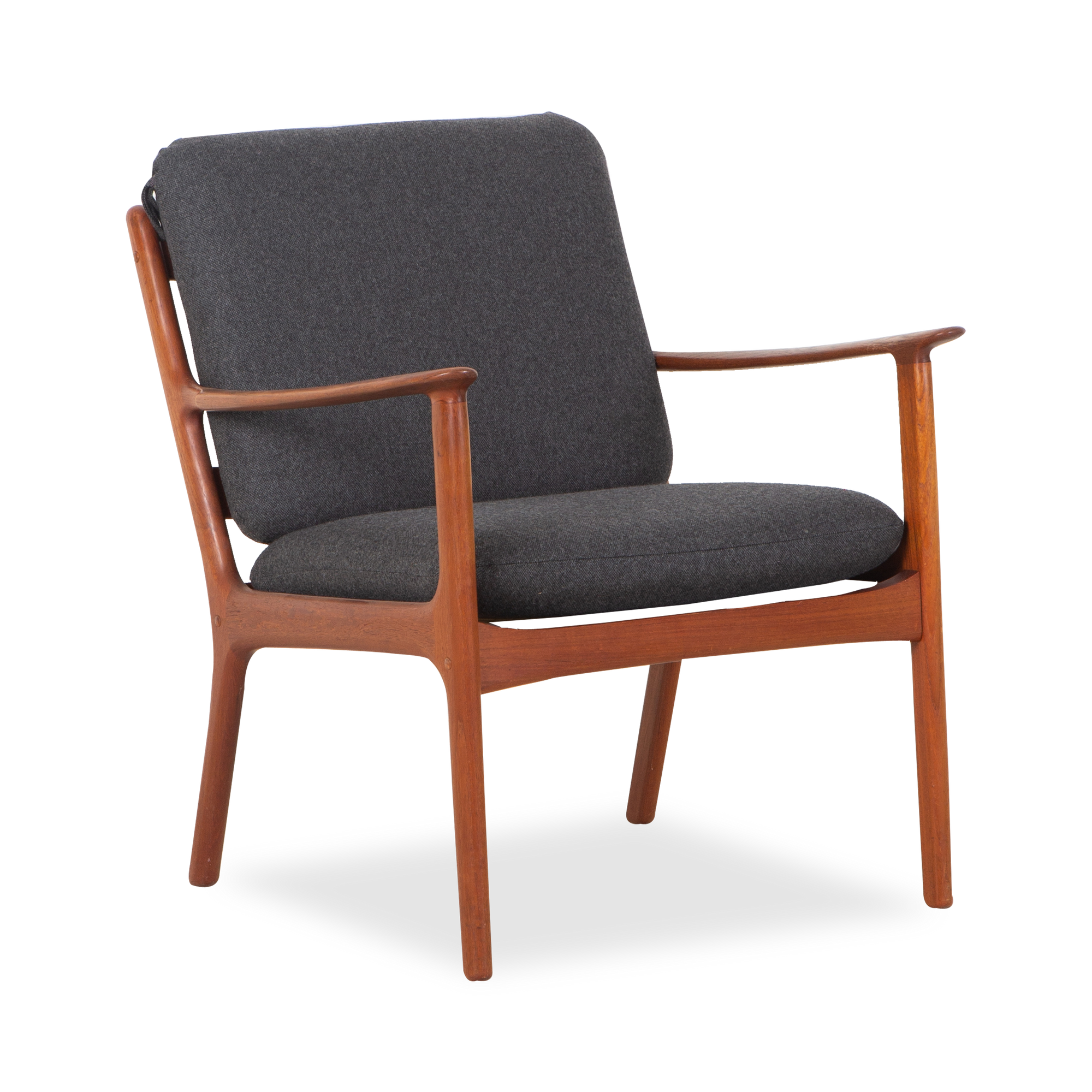 The epitome of a mid-century modern lounge chair, this vintage PJ112 Chair and matching stool were designed by Ole Wanscher and manufactured by Poul Jeppensens, circa 1960s.
