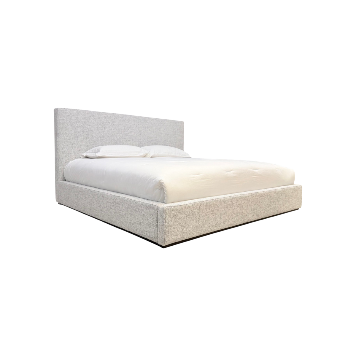 Vital King Bed in grey-and-ivory textured fabric, shown from an angled front view with softened corners and low upholstered frame.