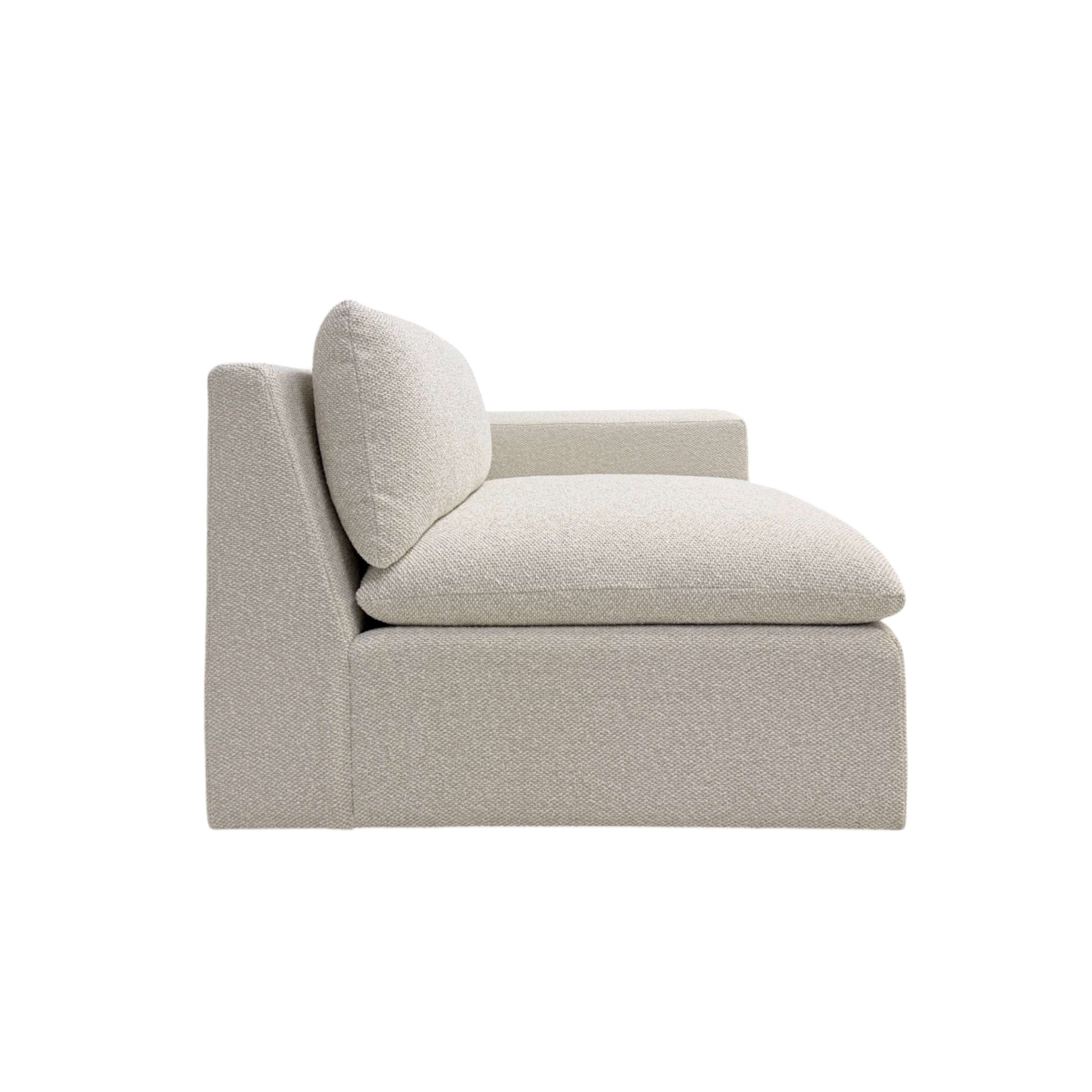 Tempo Modular RAF Chair side view highlighting the deep cushioned seat, loose back cushion, and clean low-profile form in ivory textured upholstery.