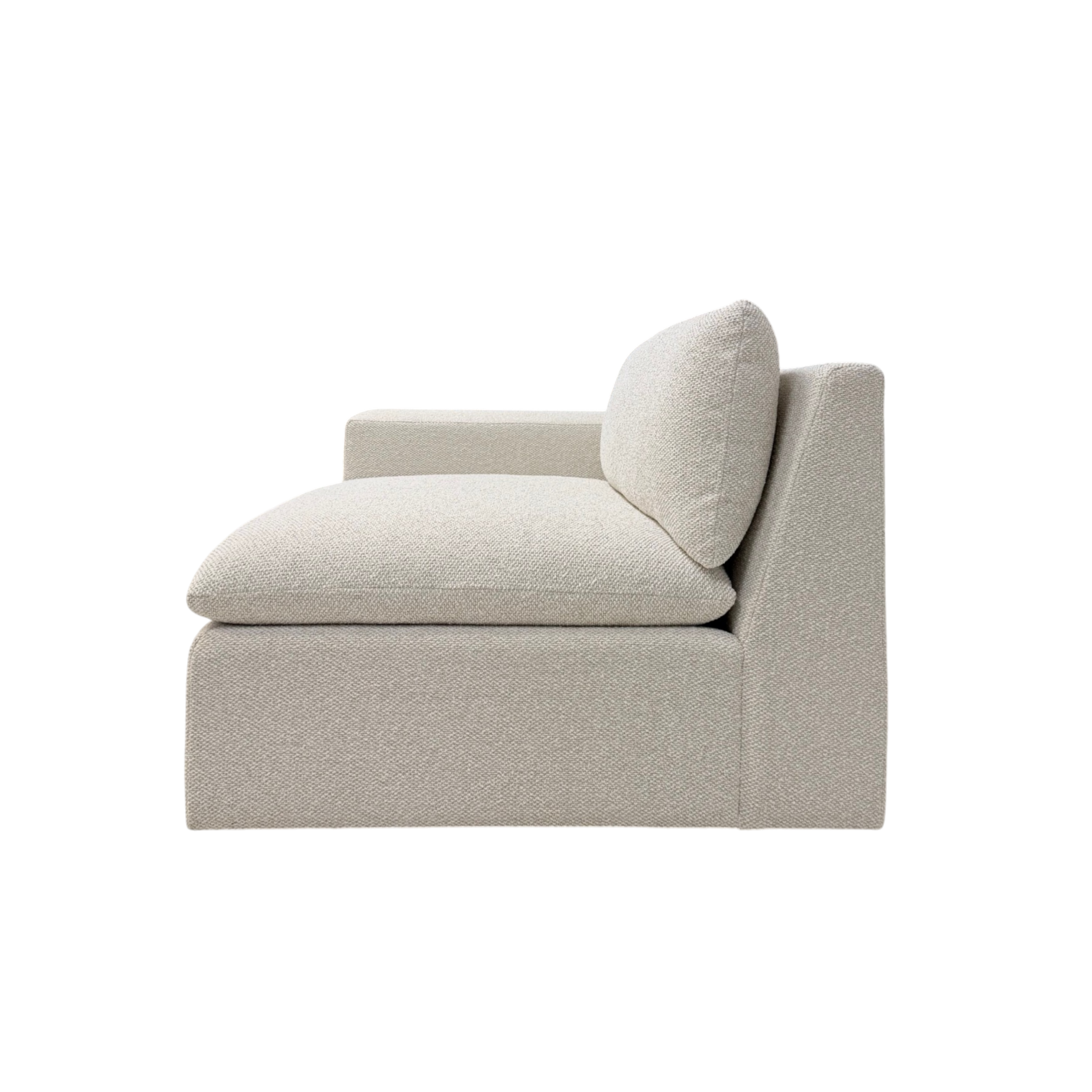 Tempo Modular LAF Chair side view highlighting the deep oversized seat cushion, loose back cushion, left arm, and softly textured ivory upholstery.