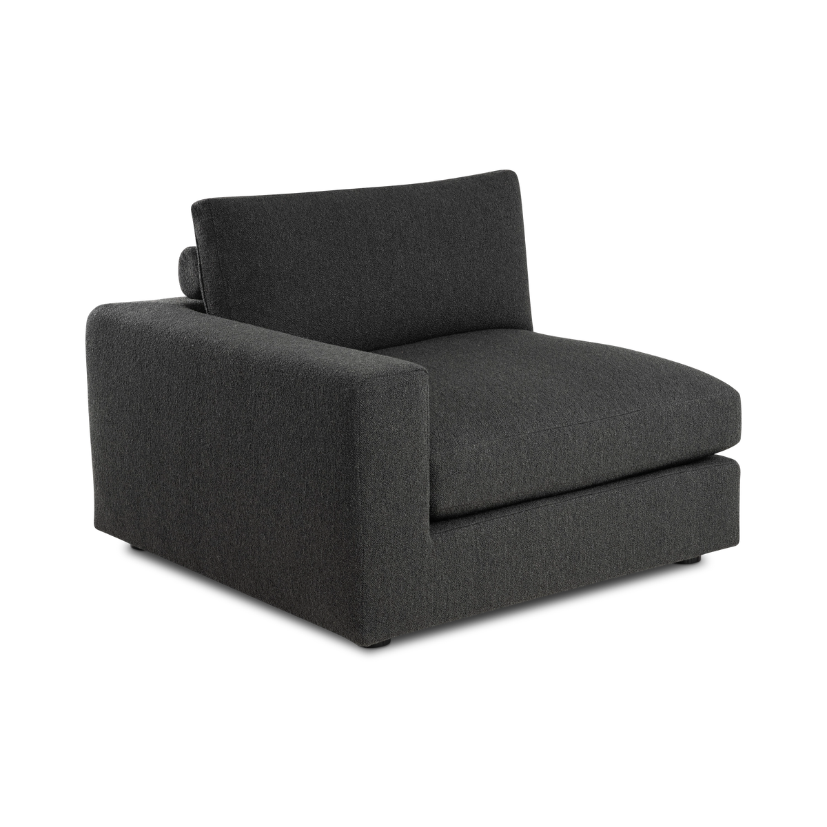 Colonna Modular LAF Chair shown in an angled view in charcoal bouclé, highlighting the wide square arm, the deep seat cushion, and the bolster tucked behind the loose back cushion.