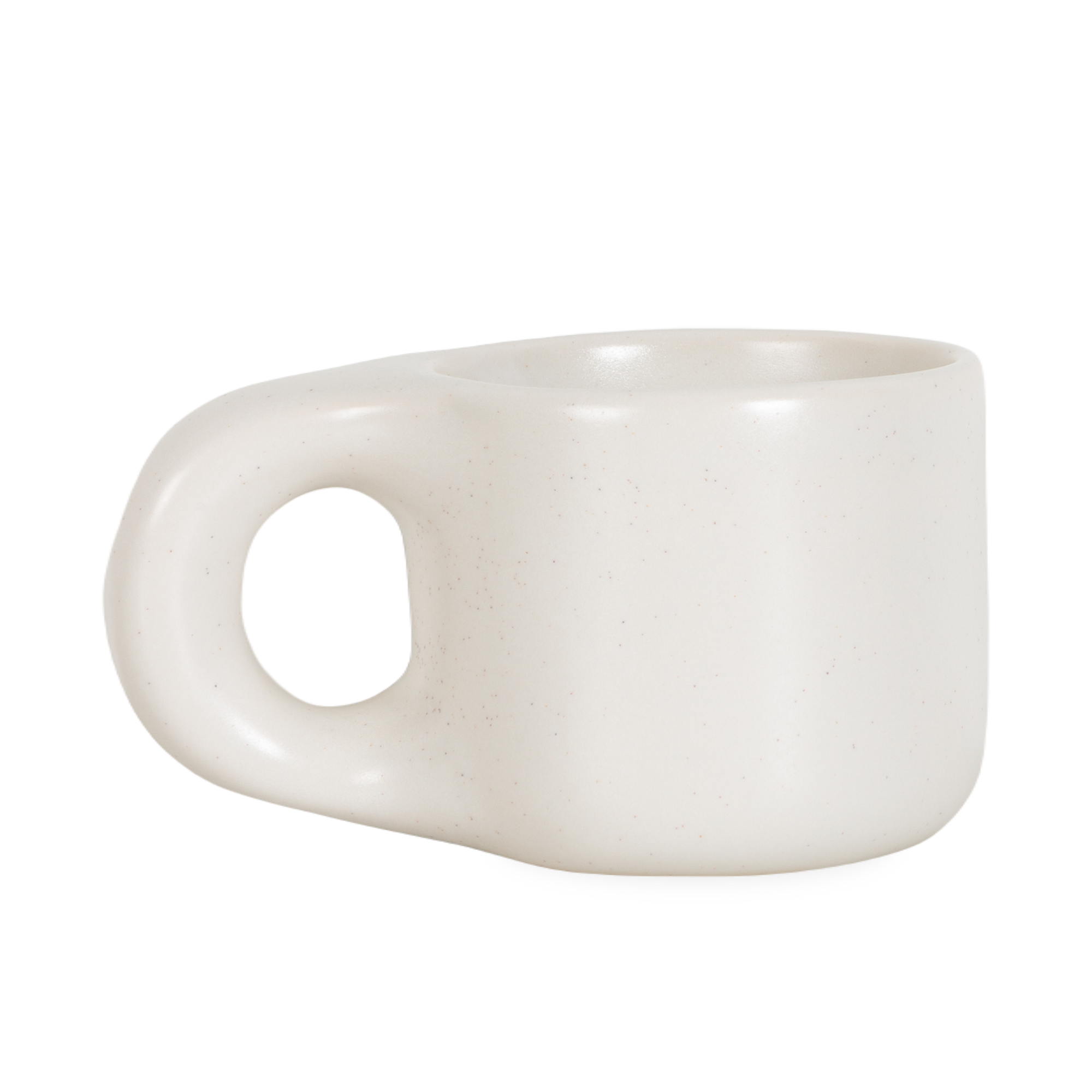Cast in stoneware from a hand-formed original, the Dough Stoneware Mug has a minimalist, sculptural quality complemented by an outsized handle, creating a uniquely portioned silhou