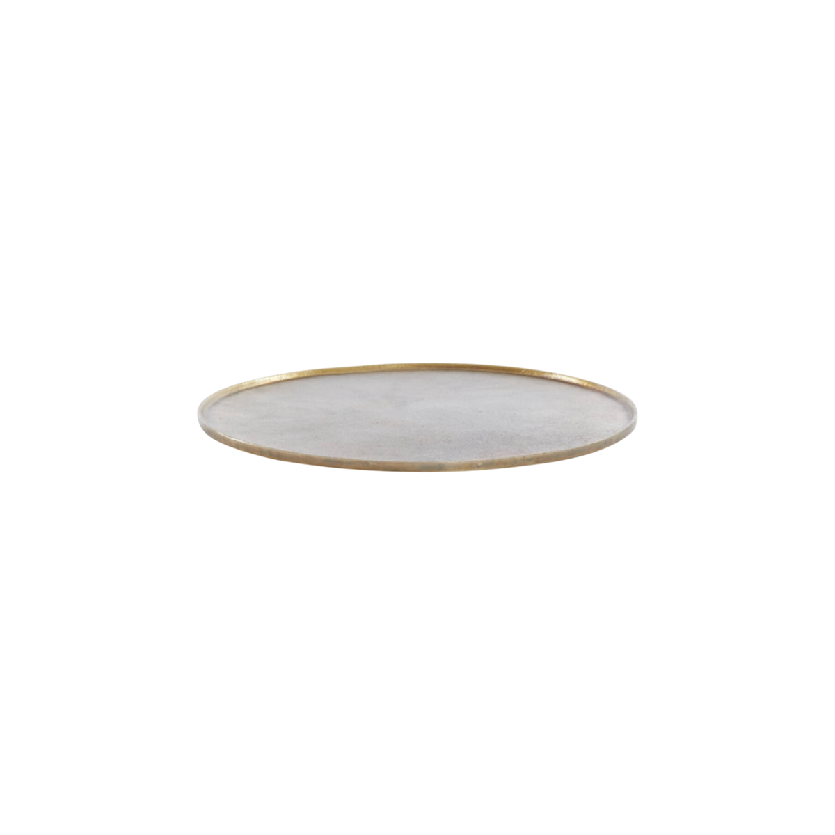 Russell Tray Round Small in antiqued brass, shown from a low side angle, with a slim raised rim, a soft grey-taupe brushed metal surface, and a worn gold edge.