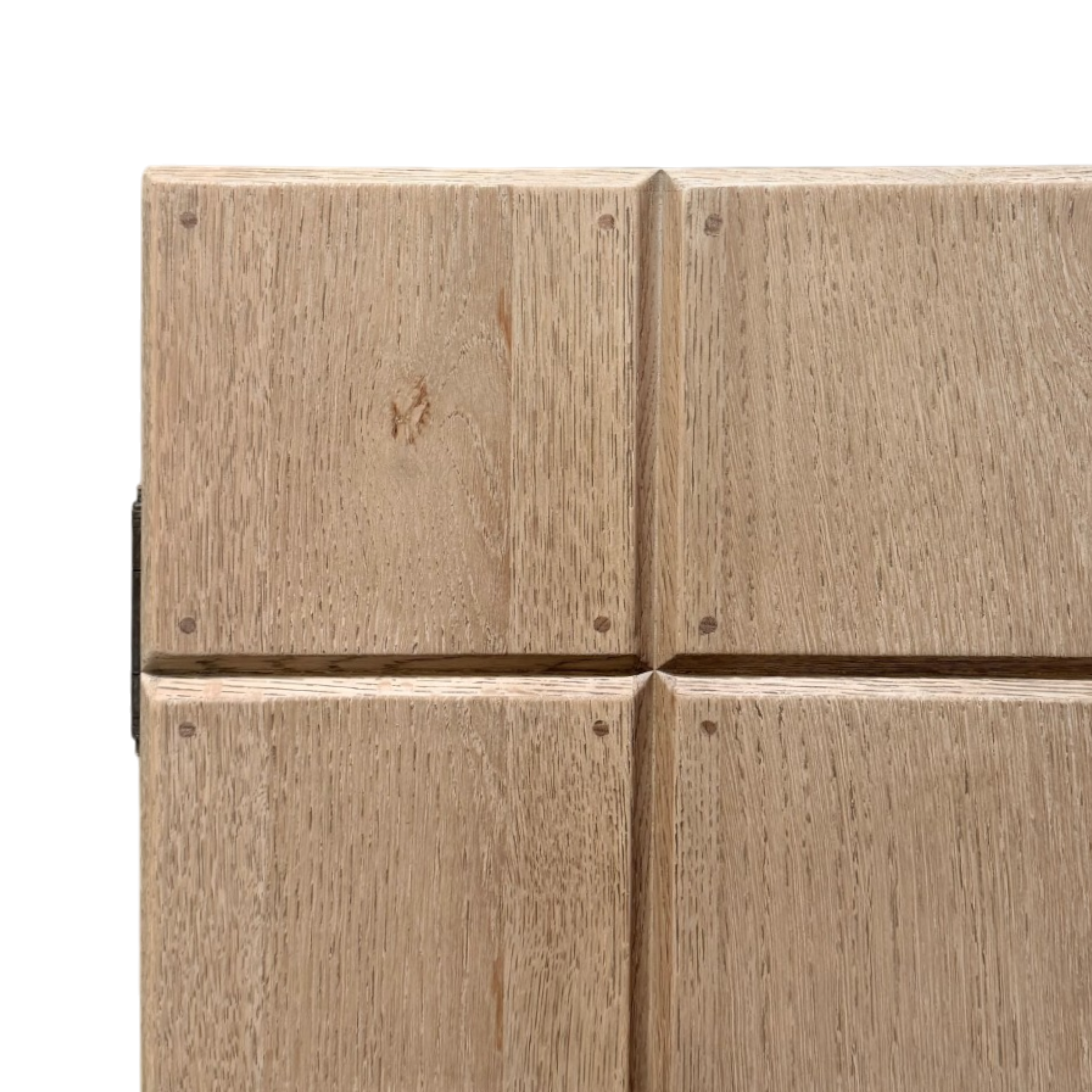 Rosedale Cabinet close-up highlighting the natural oak grain, beveled block edges, and visible dowel joinery across the geometric cabinet front.