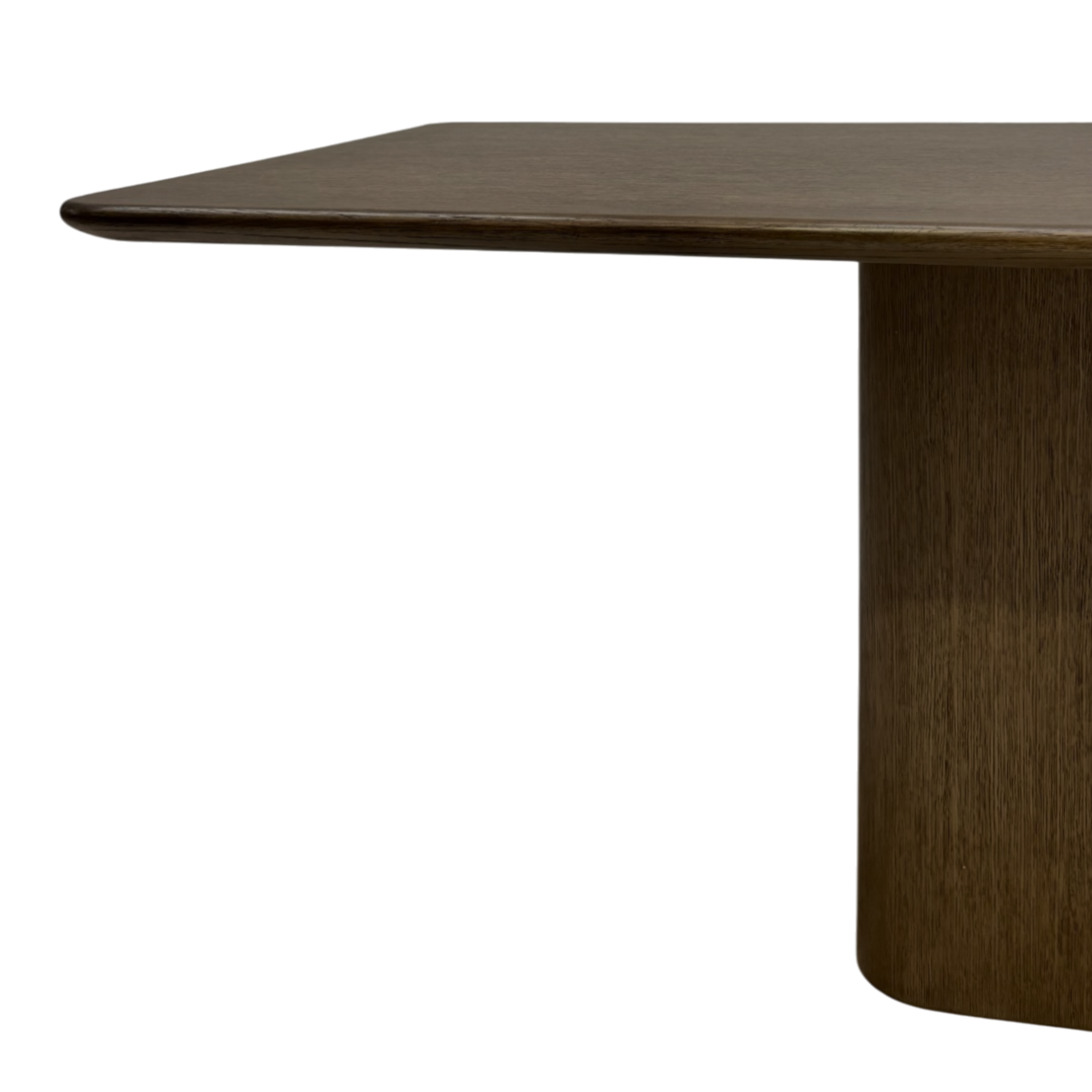Close-up of the Altar 96-inch Dining Table showing the dark wood tabletop with softly rounded edge and substantial central pedestal base.