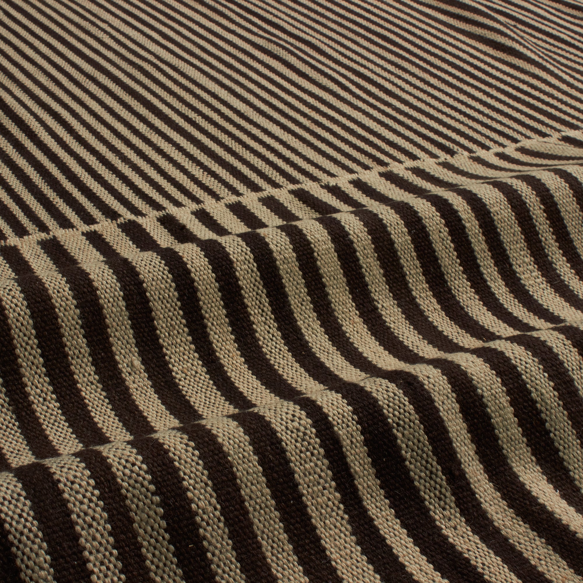 An homage to the quintessential Moroccan rug, ancient patterns are reimagined as bold, geometric forms.