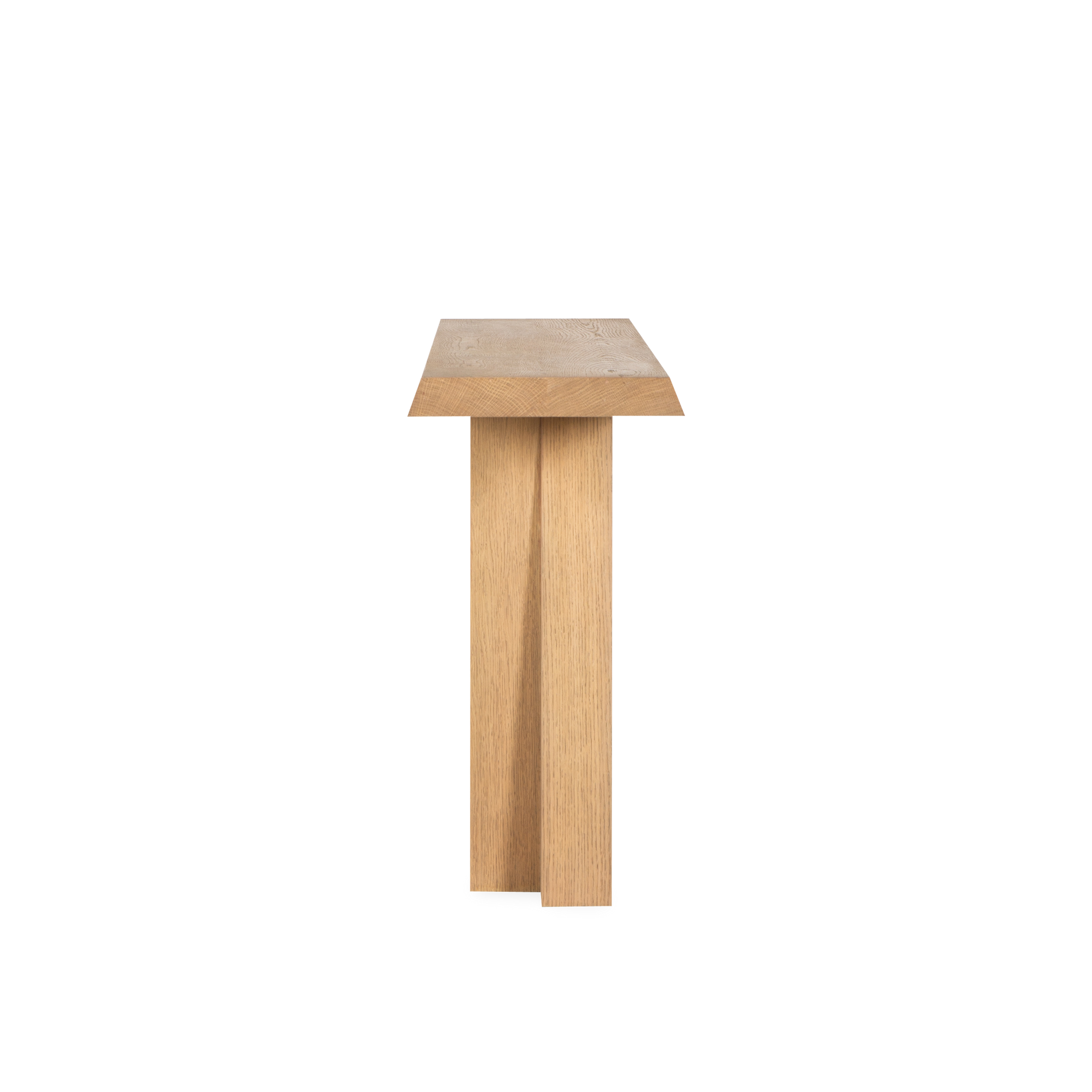 The Oblique Console Table draws inspiration from the raw power and geometric precision of 1960s Brutalist architecture.
