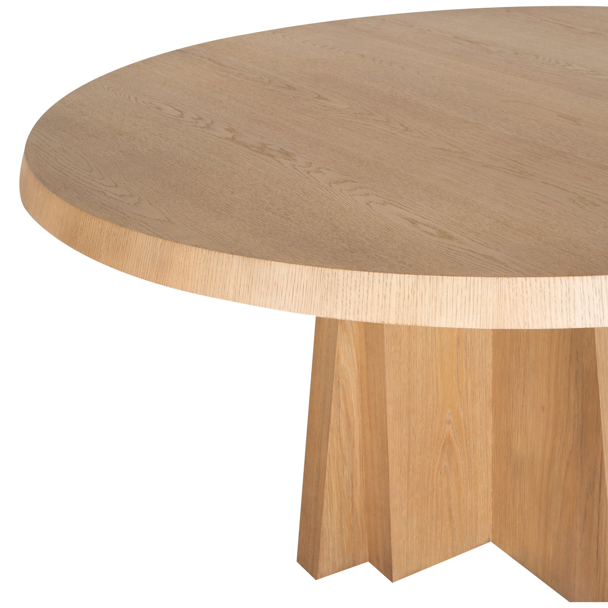 The Oblique Round Dining Table draws inspiration from the raw power and geometric precision of 1960s Brutalist architecture.