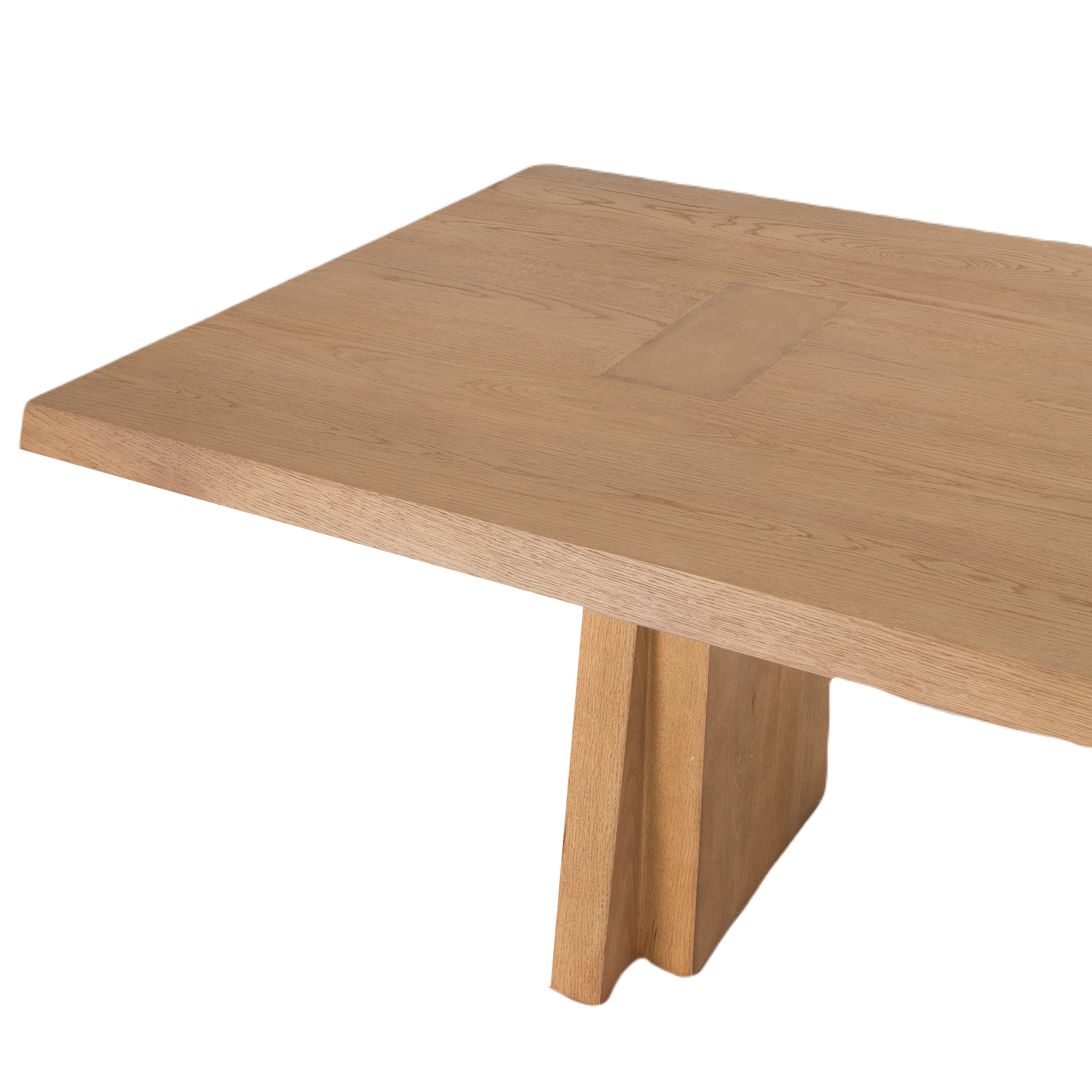 The Oblique Rectangular Dining Table draws inspiration from the raw power and geometric precision of 1960s Brutalist architecture.