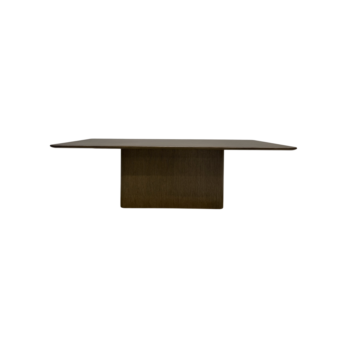 Altar Dining Table in dark wood with a long rectangular top, softly rounded edges and a substantial central pedestal base.