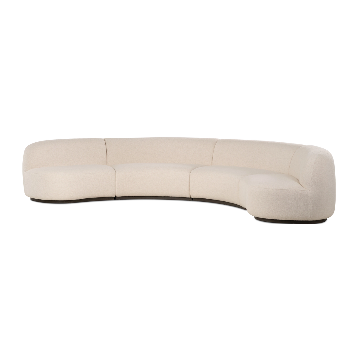 Angled view of the Rhine Modular Sectional Sofa in cream bouclé, showing the gently curving back, the rounded arm on the right end, and the dark sculpted base beneath.
