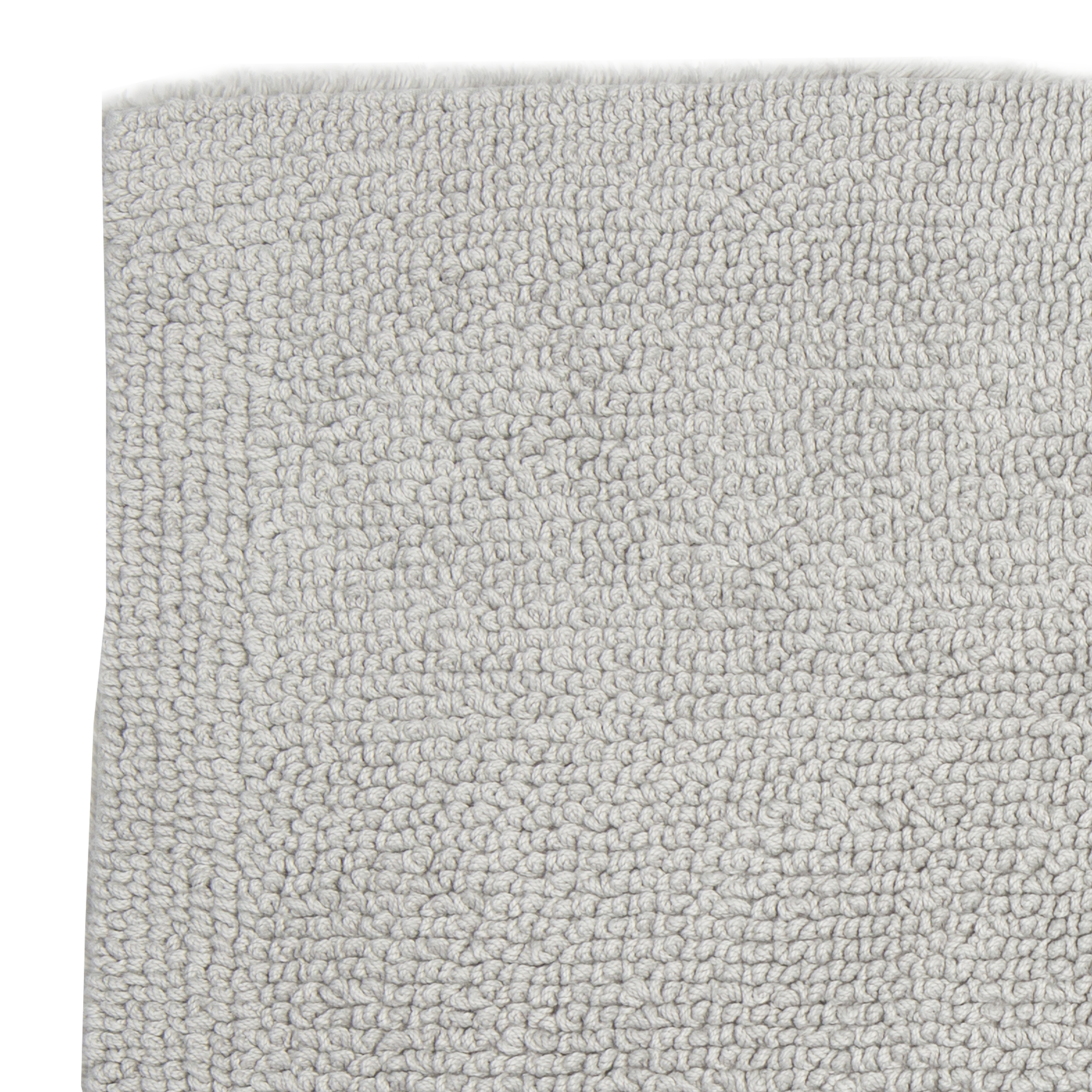 The Bay bath mat is made in Portugal from 100% Egyptian cotton for a soft feel.