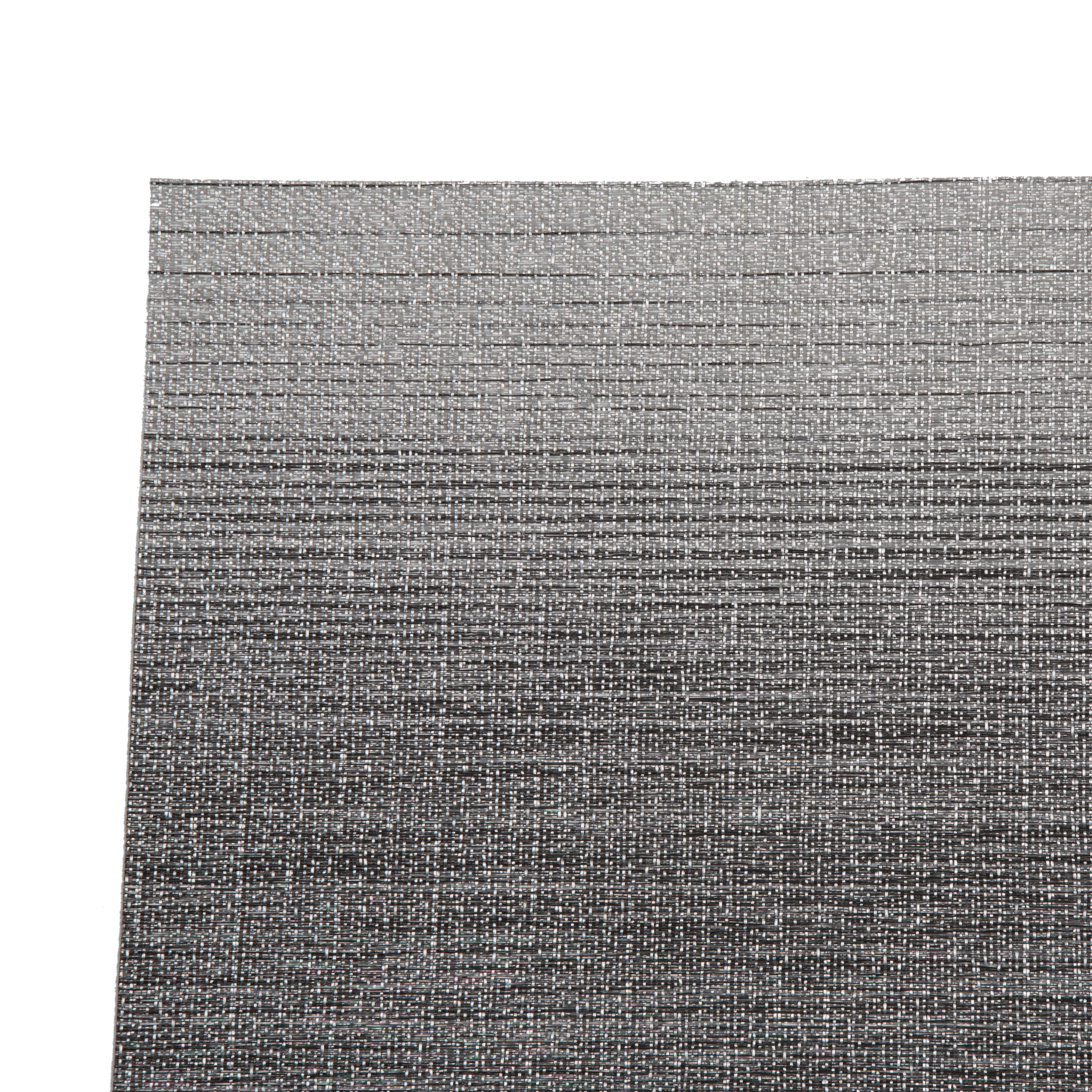 The placemat has a textured weave featuring a unique rotation of Chilewich's signature bi-color yarns to create a subtle ombré effect in the warp.