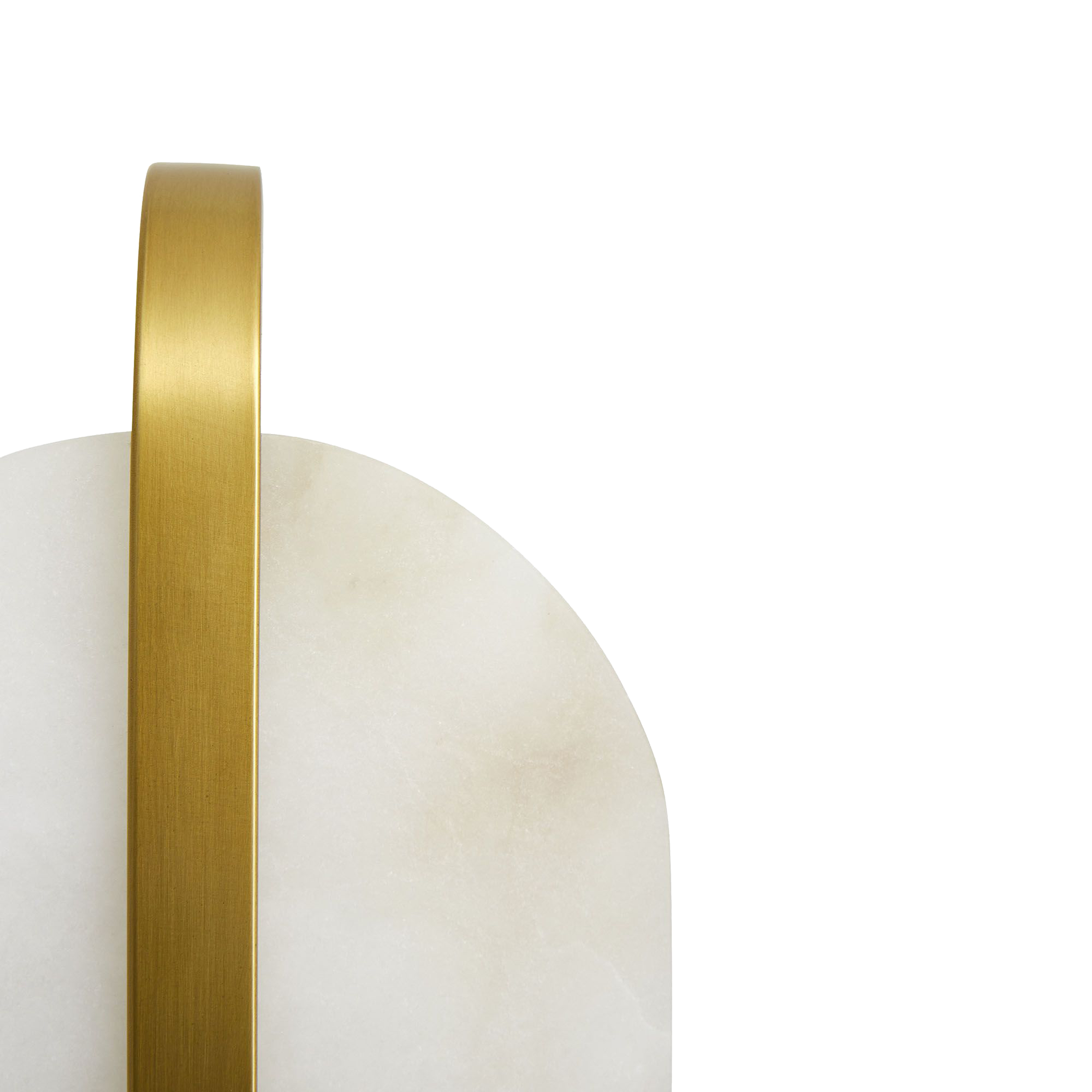 The Julius is a classically-modern design showcasing a capsule-shaped white alabaster foundation, met with an antique brass steel bracket perfectly centered.