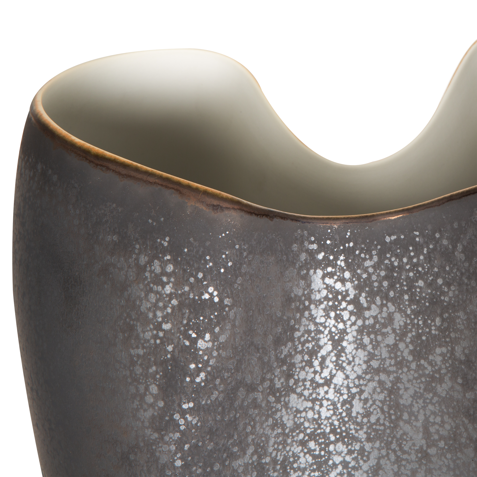 Expertly crafted and exceptionally captivating, the Oxus Vase feature a highly reactive Raku-like glaze on porcelain.