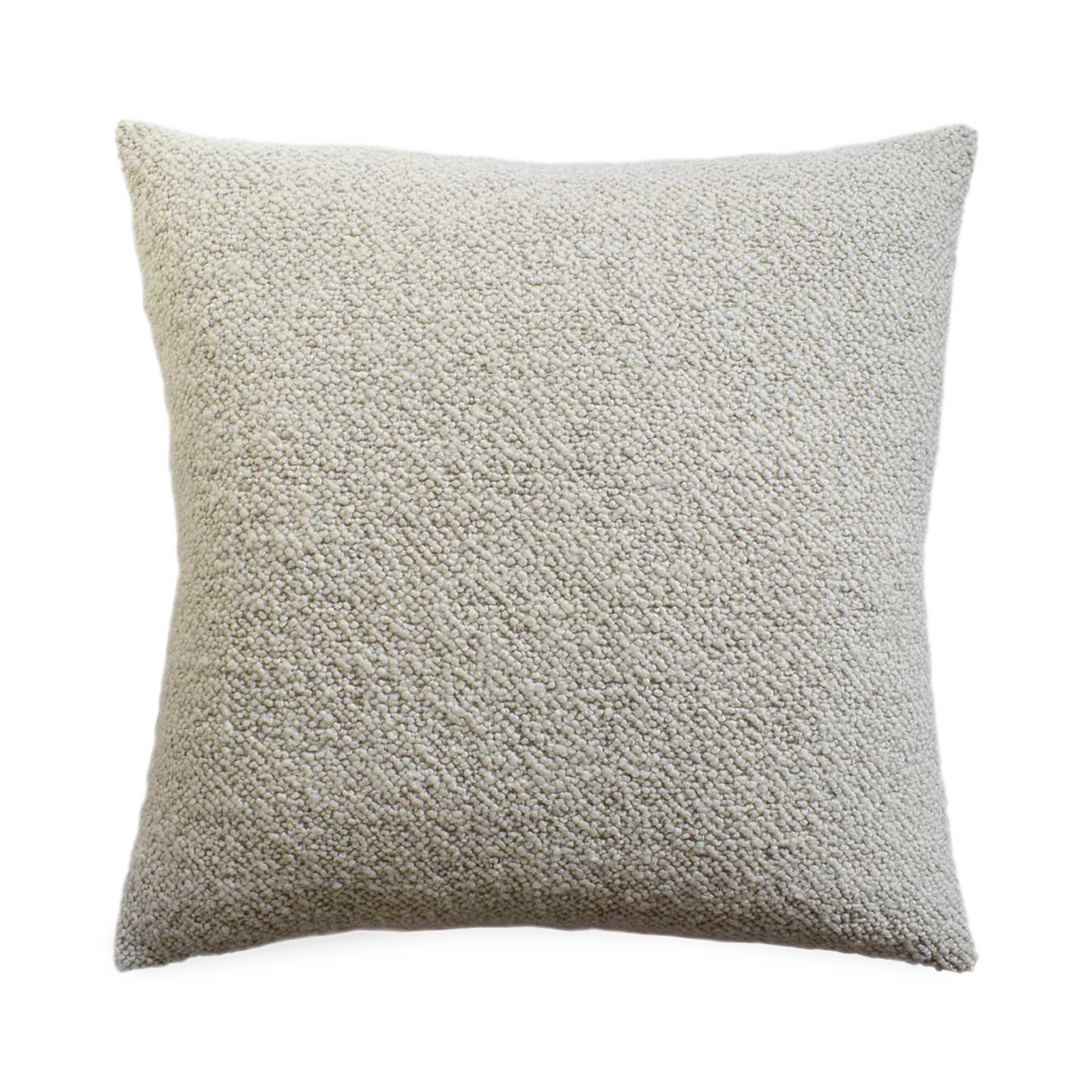 The Tasmin pillow features a plush texture and monocromatic palette.