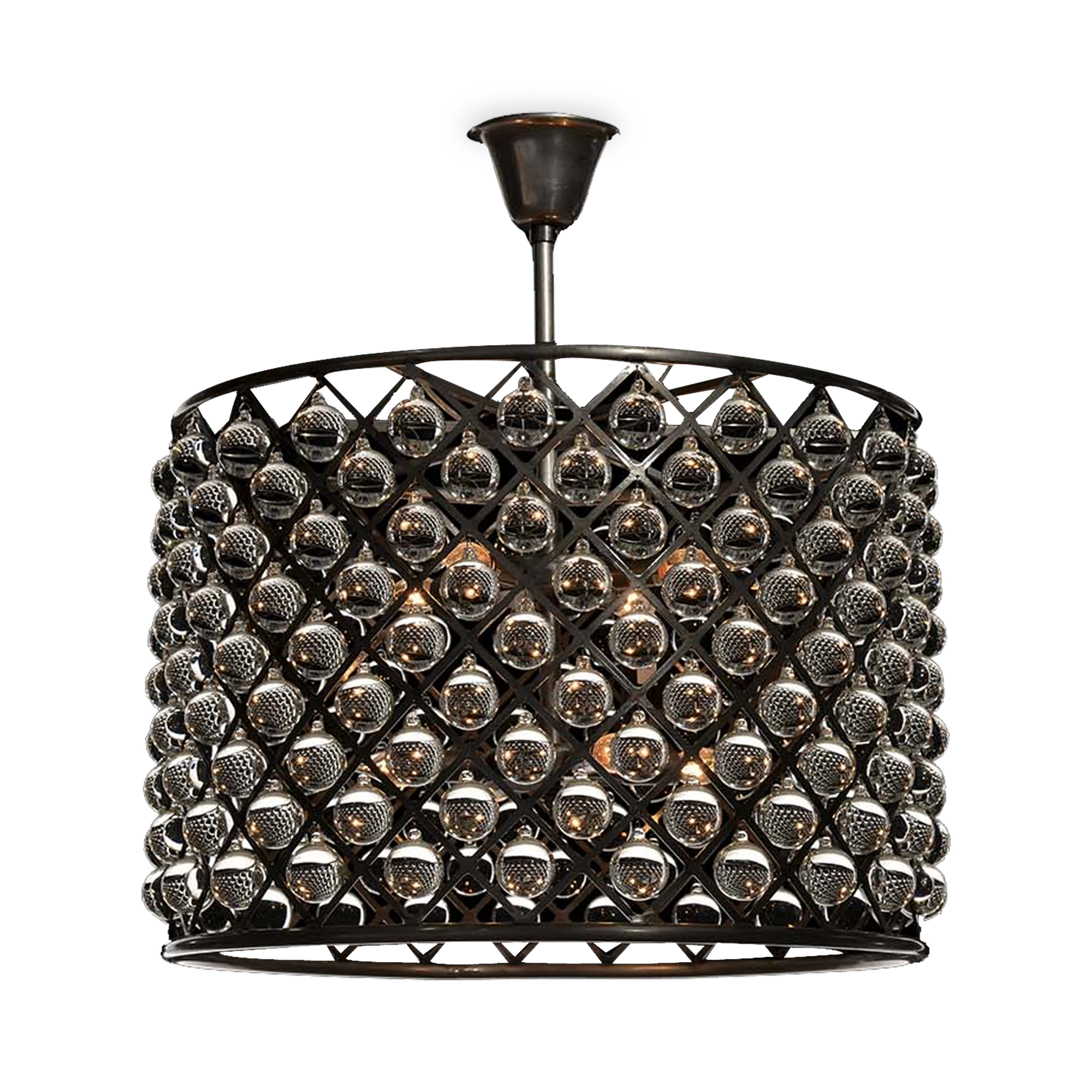 The Zig Zag Chandelier features delicate spheres of handpolished glass suspended from an intricate iron skeleton.