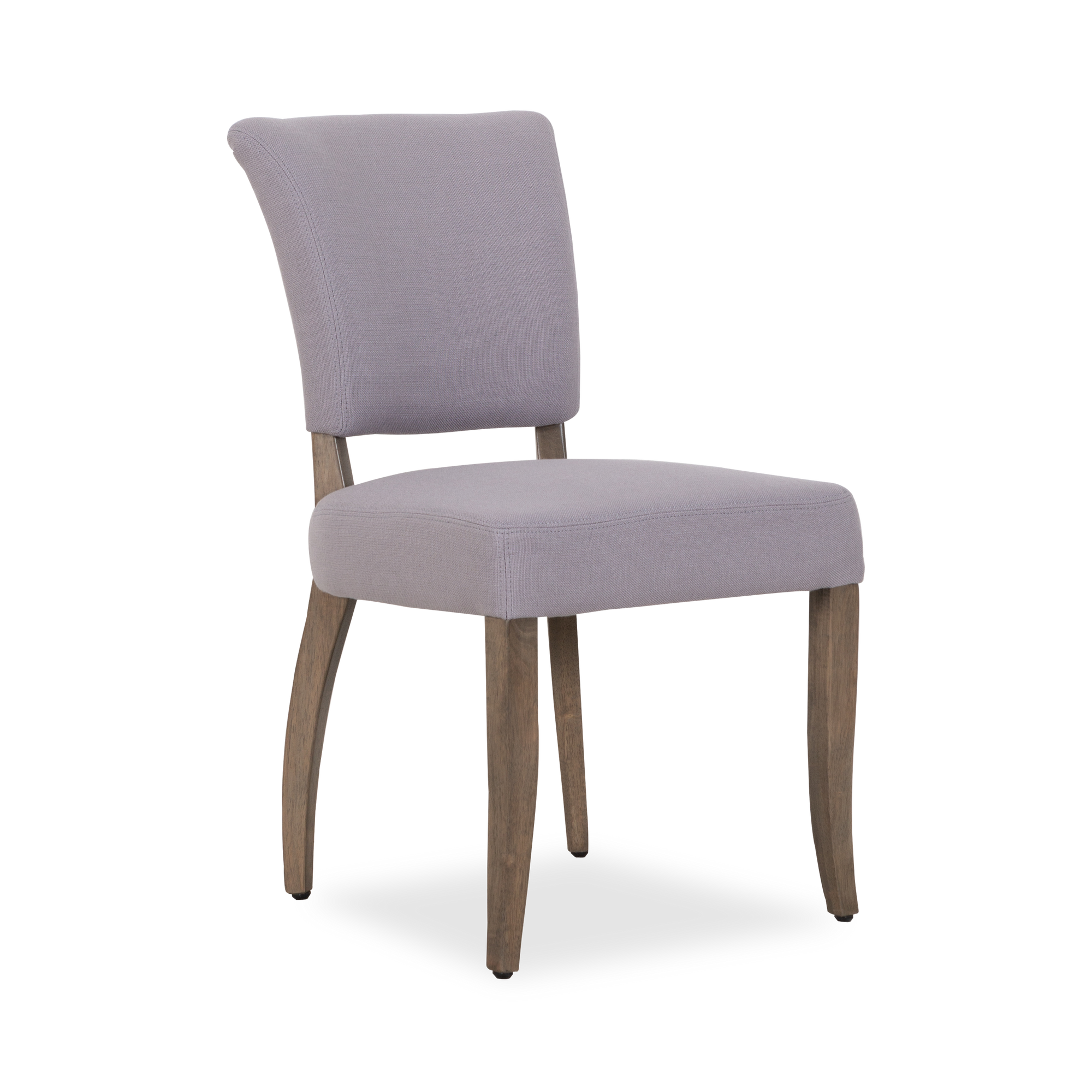 The Mimi Dining Side Chair is a reinvention of a classic 1940s French dining chair with stud detailing and tapered wooden legs.