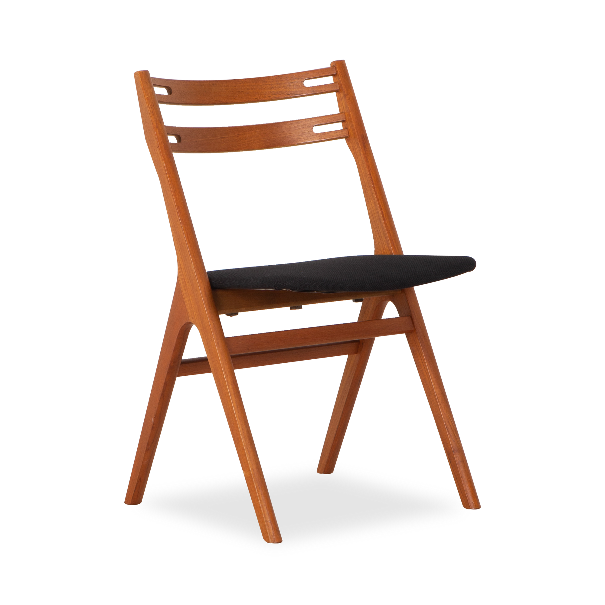 A great example of Scandinavian design and carpentry of the mid-century, this vintage chair was designed by Edmund Jorgensen and manufactured by Jorgensen Mobelfabrik, circa 1960s.