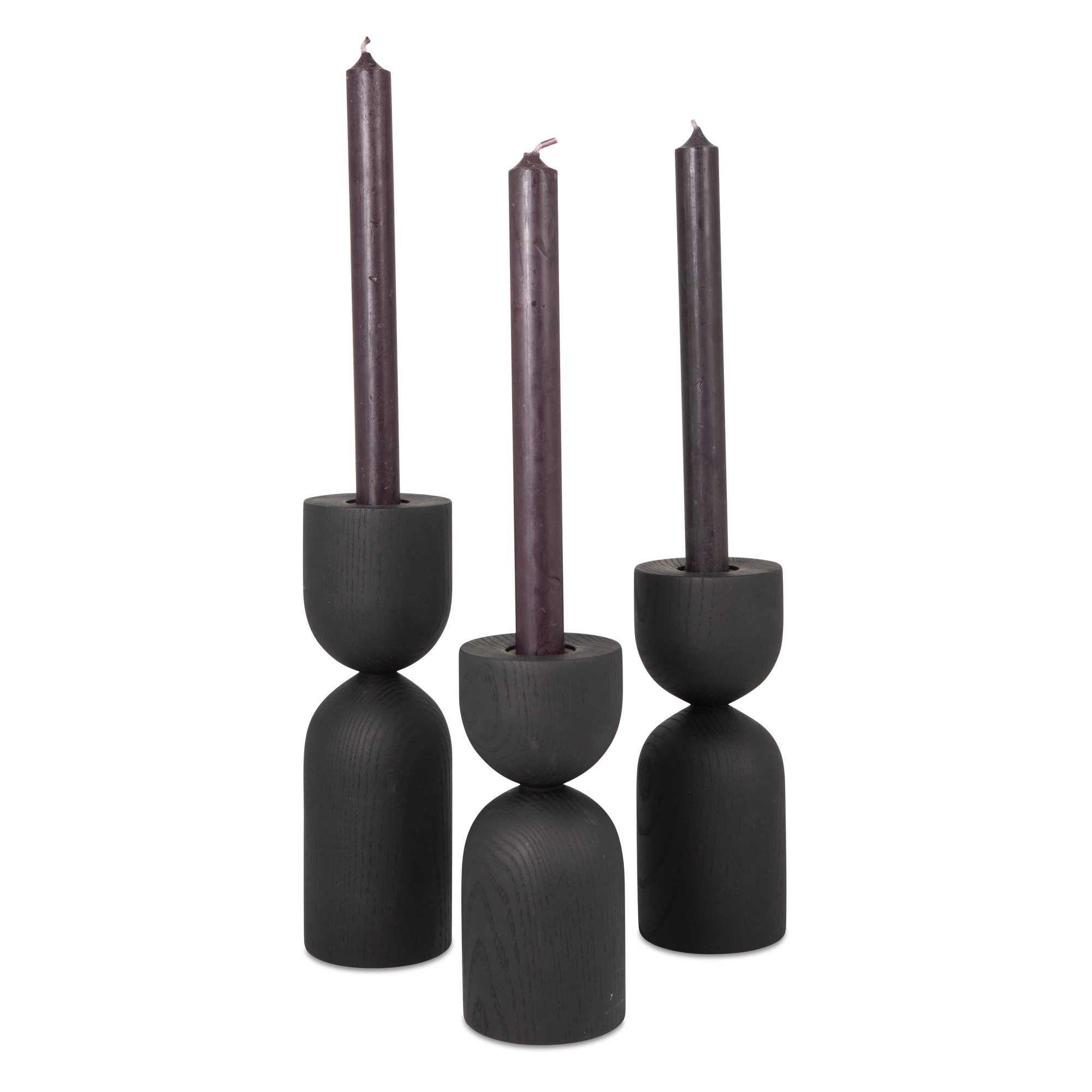 Turned from solid ebonized ash wood, the Hourglass Taper Candleholder feature distinct and eye-catching forms.