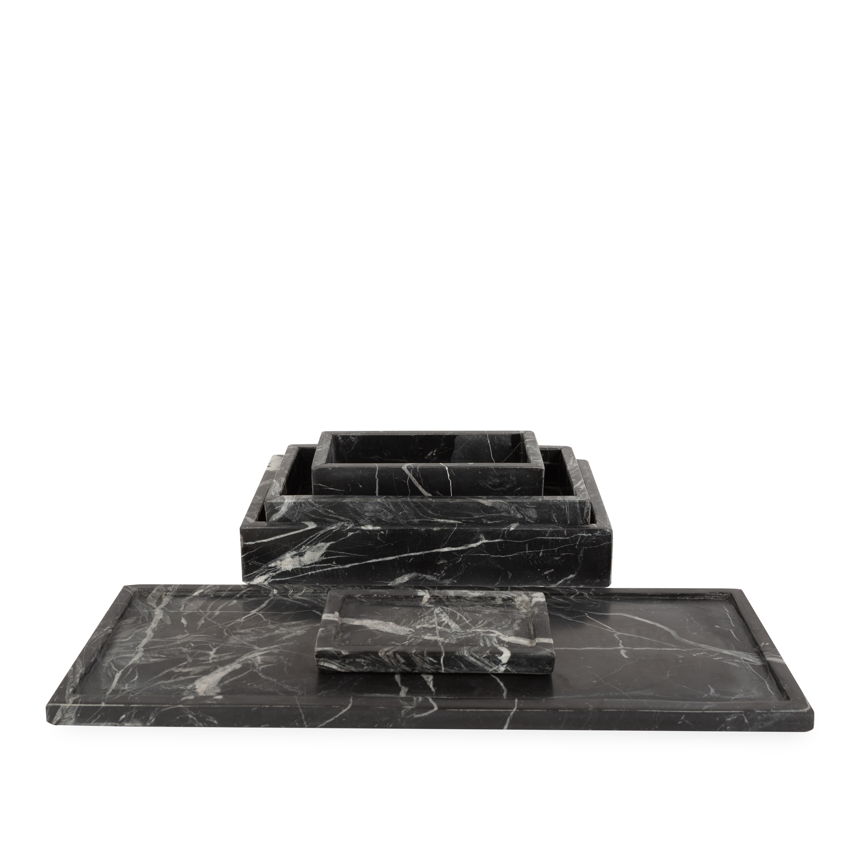 Beautifully handcrafted by skilled artisans, the Marble Collection accessories are made from black marble with natural white veins.