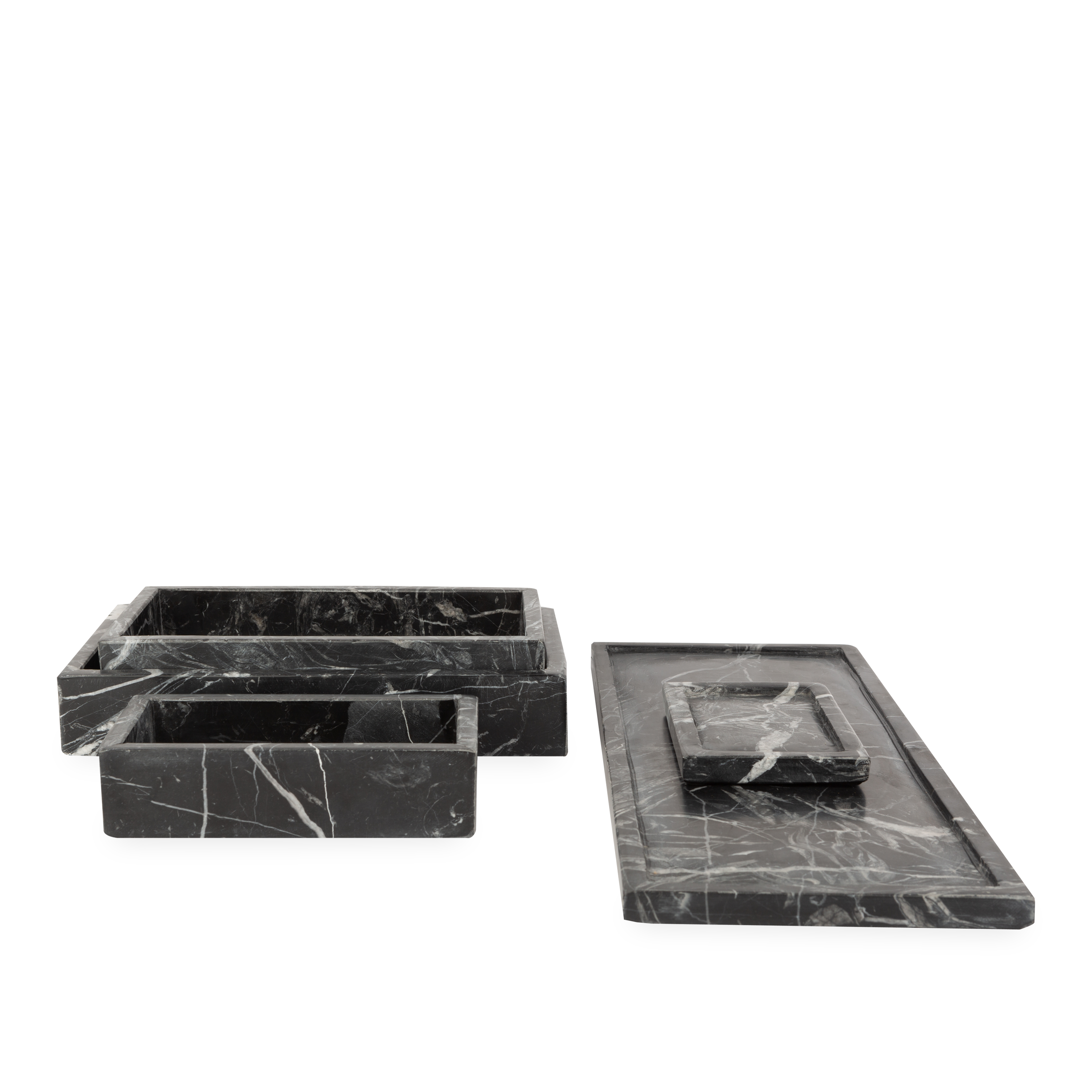Beautifully handcrafted by skilled artisans, the Marble Collection accessories are made from black marble with natural white veins.