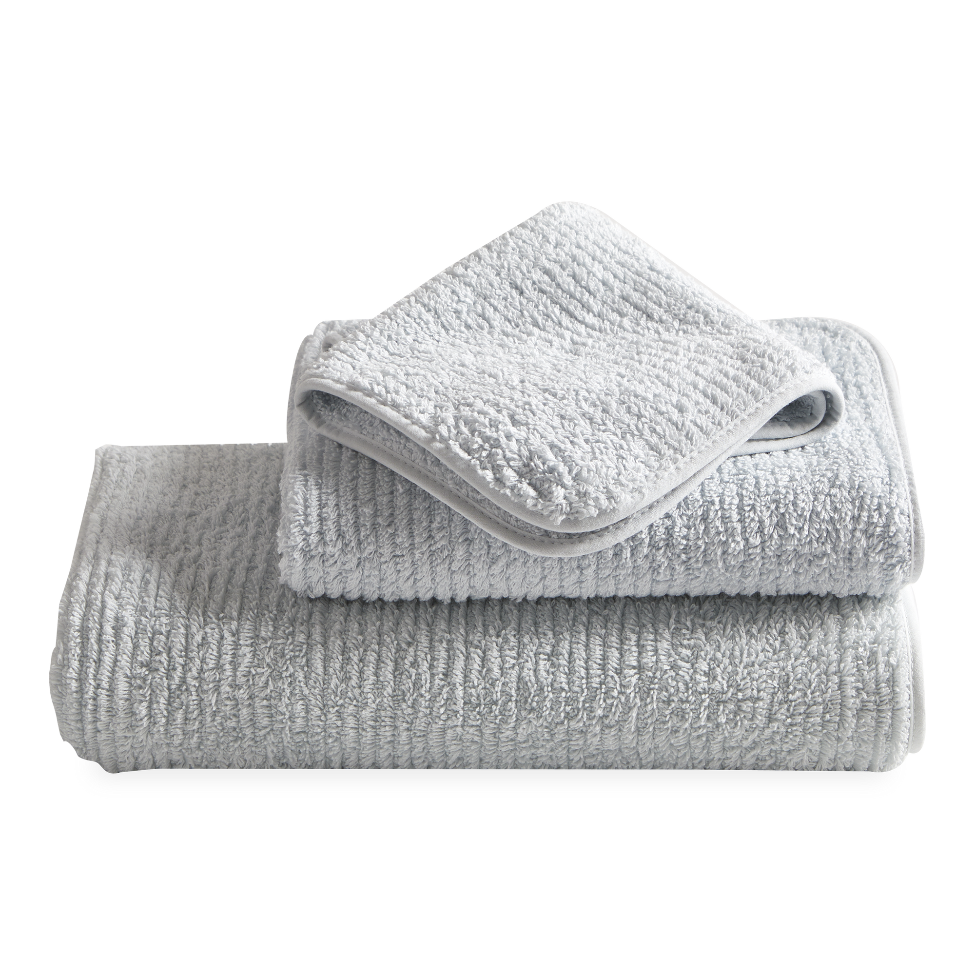 Carefully woven with a soft long pile, the Hammam Textured towels are lusciously thick with textured lines on the surface and are finished with a piped edge for subtle detail.