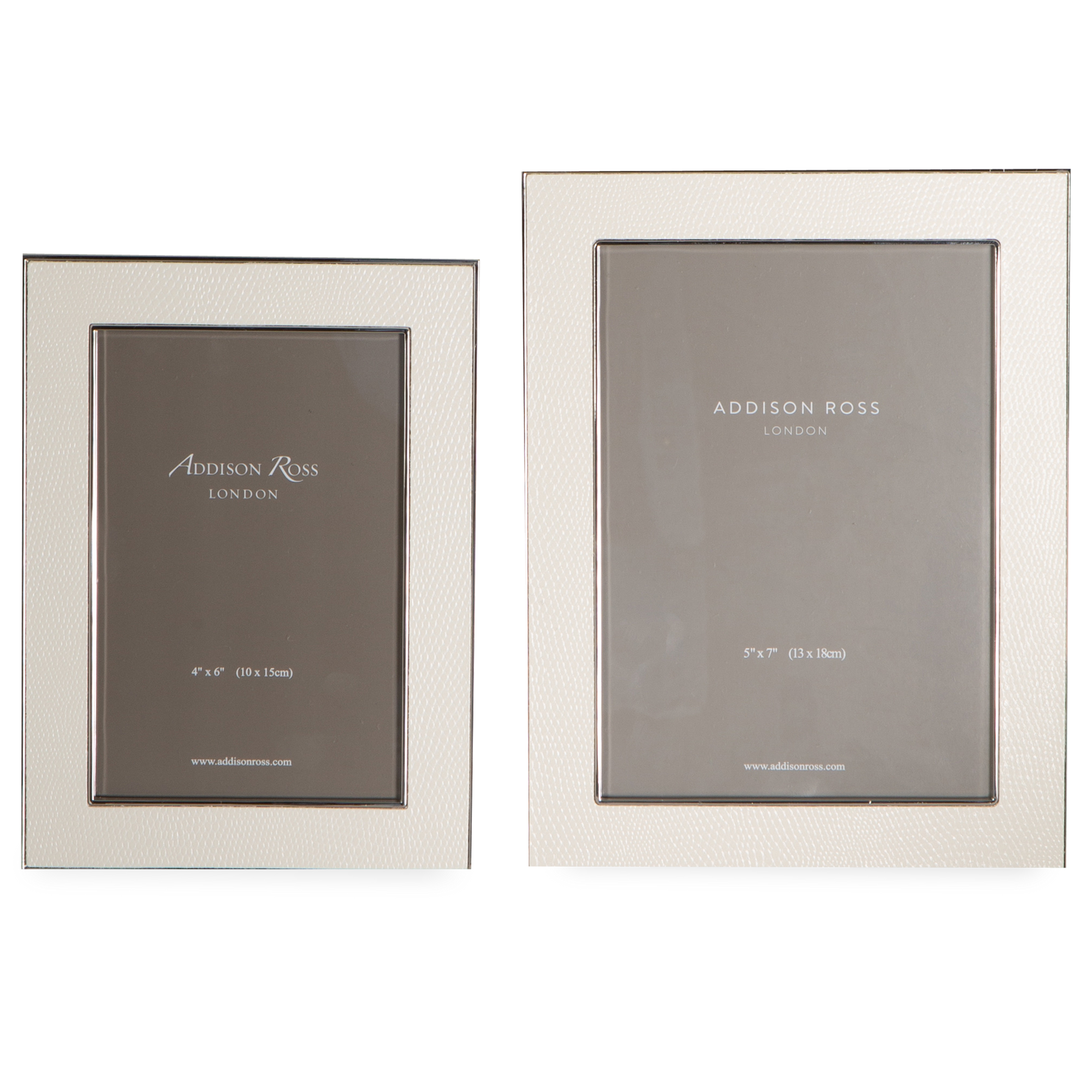 Bold and unique, this picture frame is made with faux white snake skin and silver and is backed with luxury velvet.